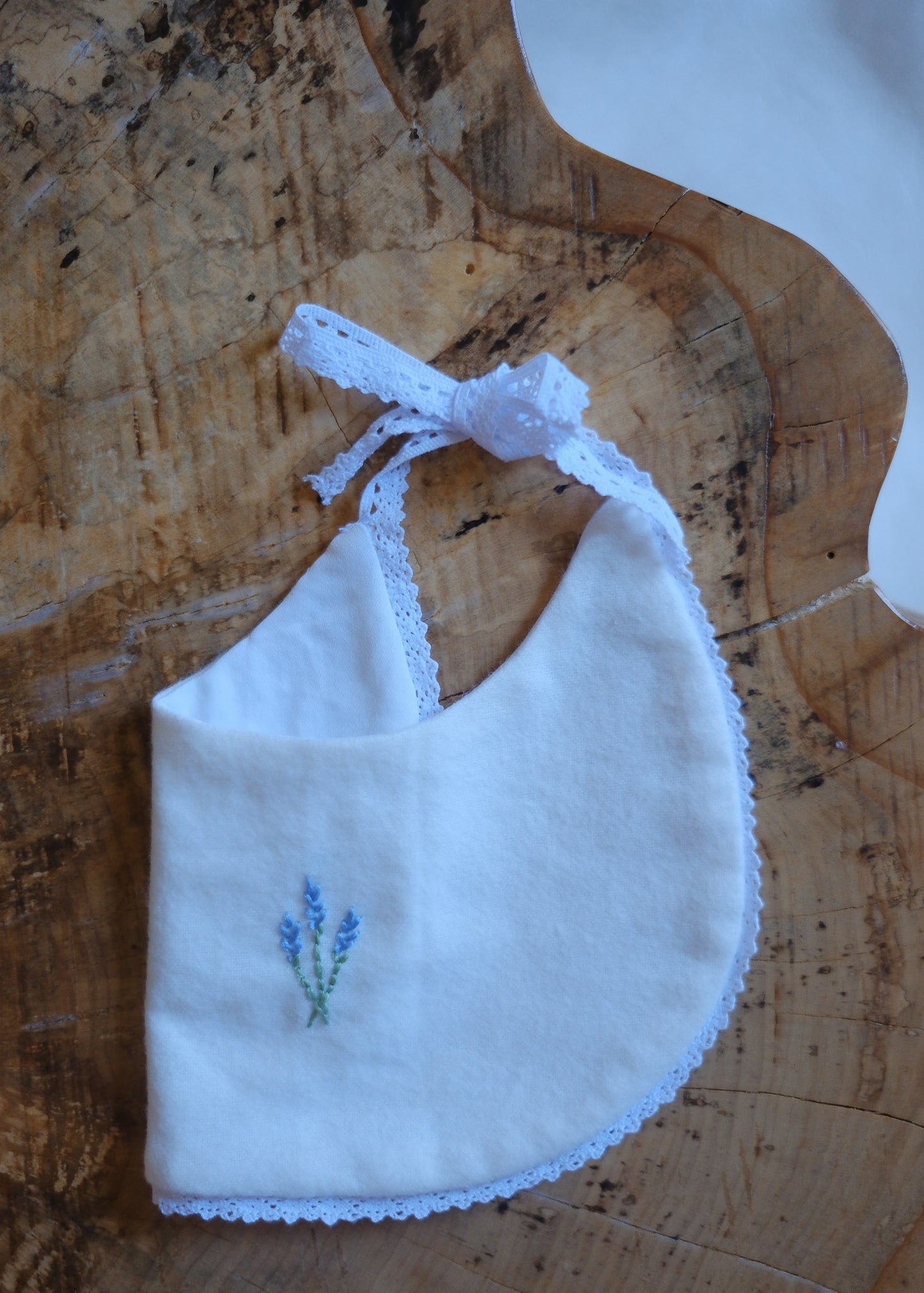 White Cotton Bib with Blue Embroidered Flowers